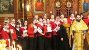 (Russian) В Европе с успехом прошли гастроли православного детского хора из Новосибирска